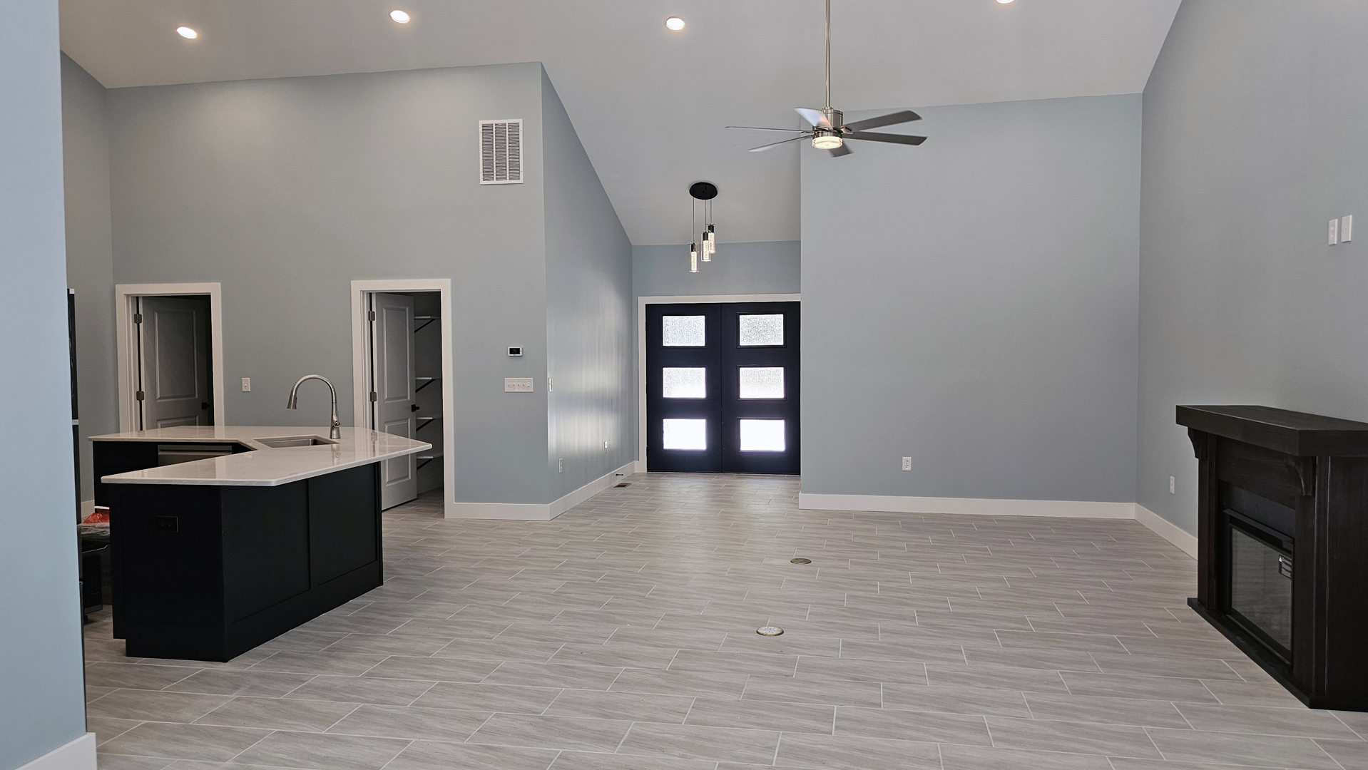Great room and kitchen inside the Baird House custom home in Bloomington Indiana