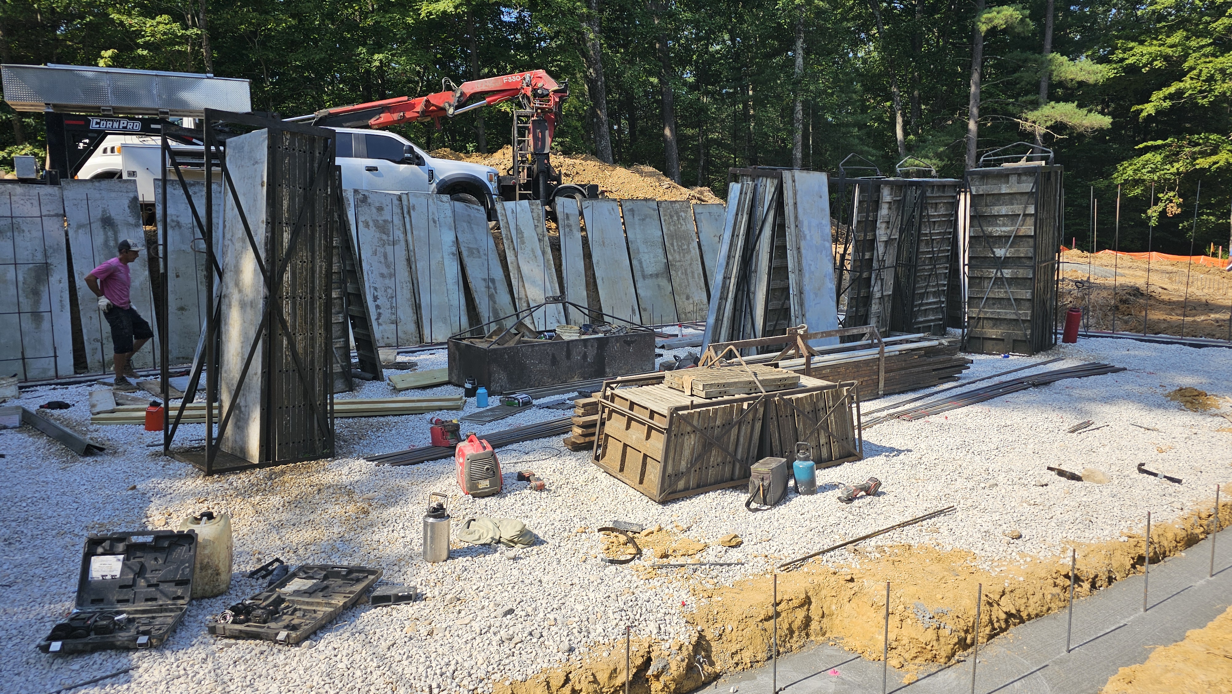 Concrete wall forms during Chamness House foundation construction
