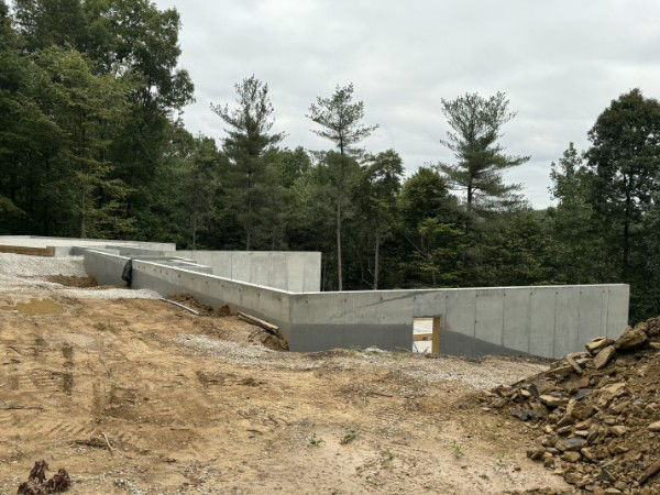 Completed poured concrete basement walls at the Chamness House