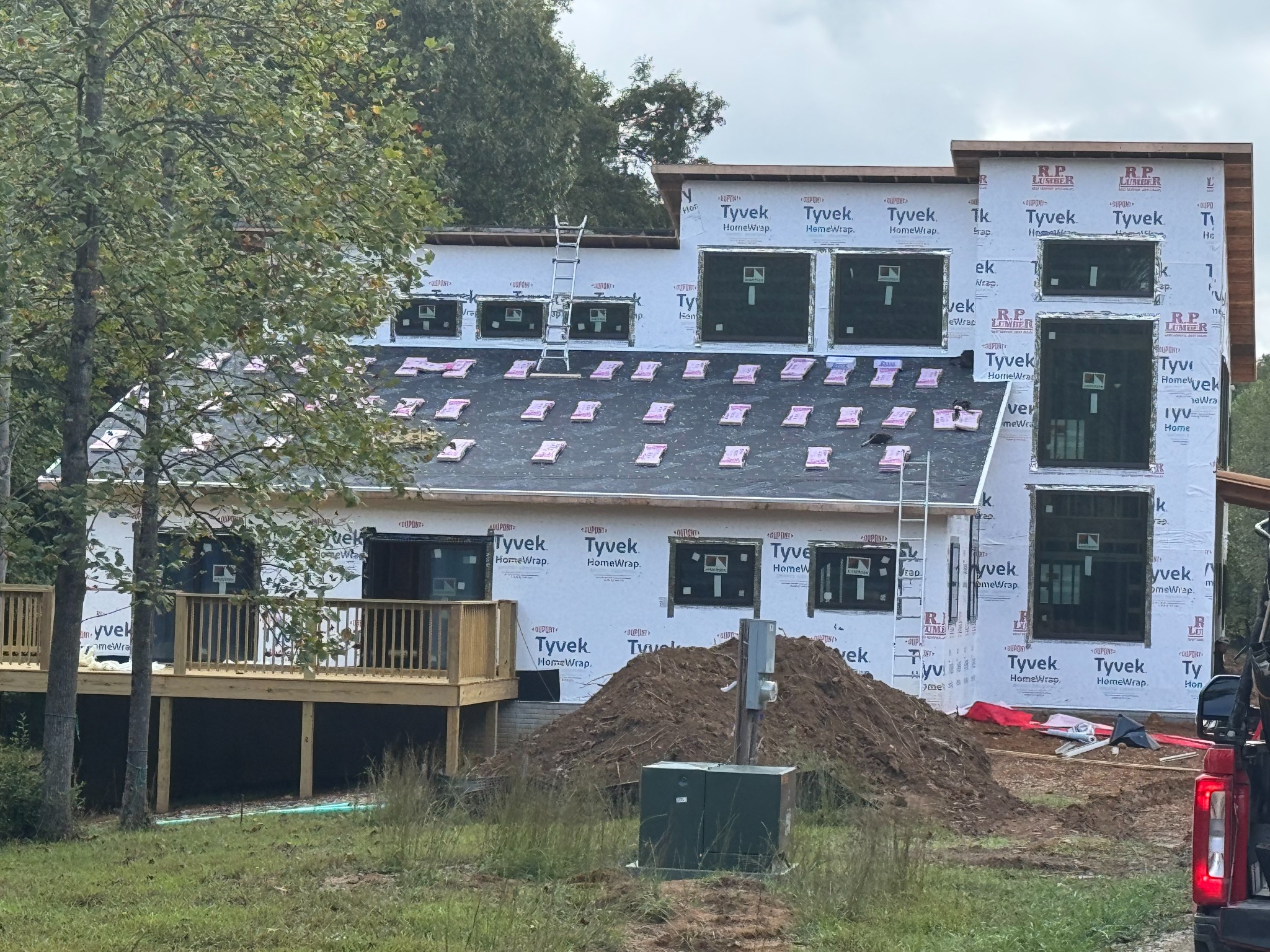 Ventura House exterior under construction with windows and roofing in progress